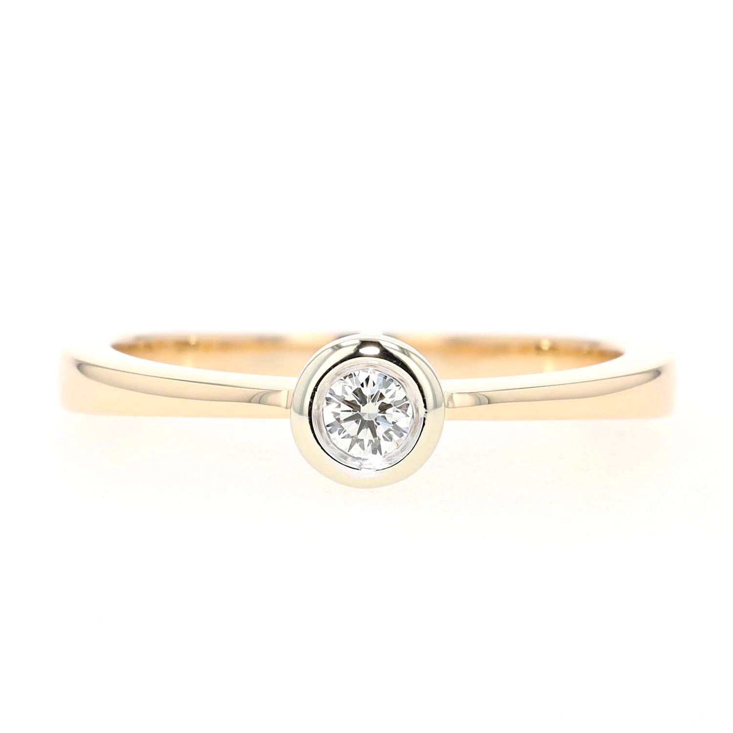 Christ Ring in 585er Gelbgold mit einem Brillanten, liegend frontal