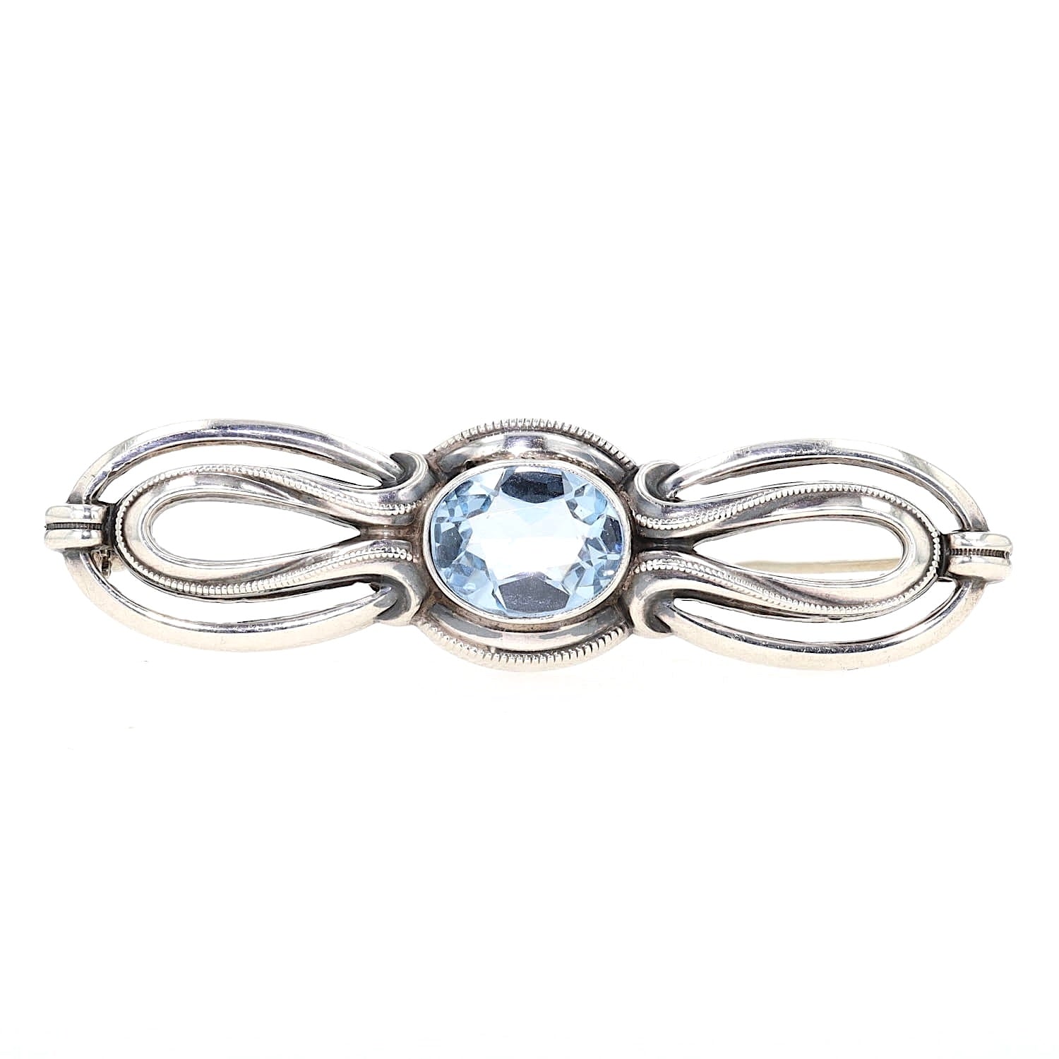 Art Deco Brosche in 925 Silber mit einem blauen synth. Spinell, liegend frontal