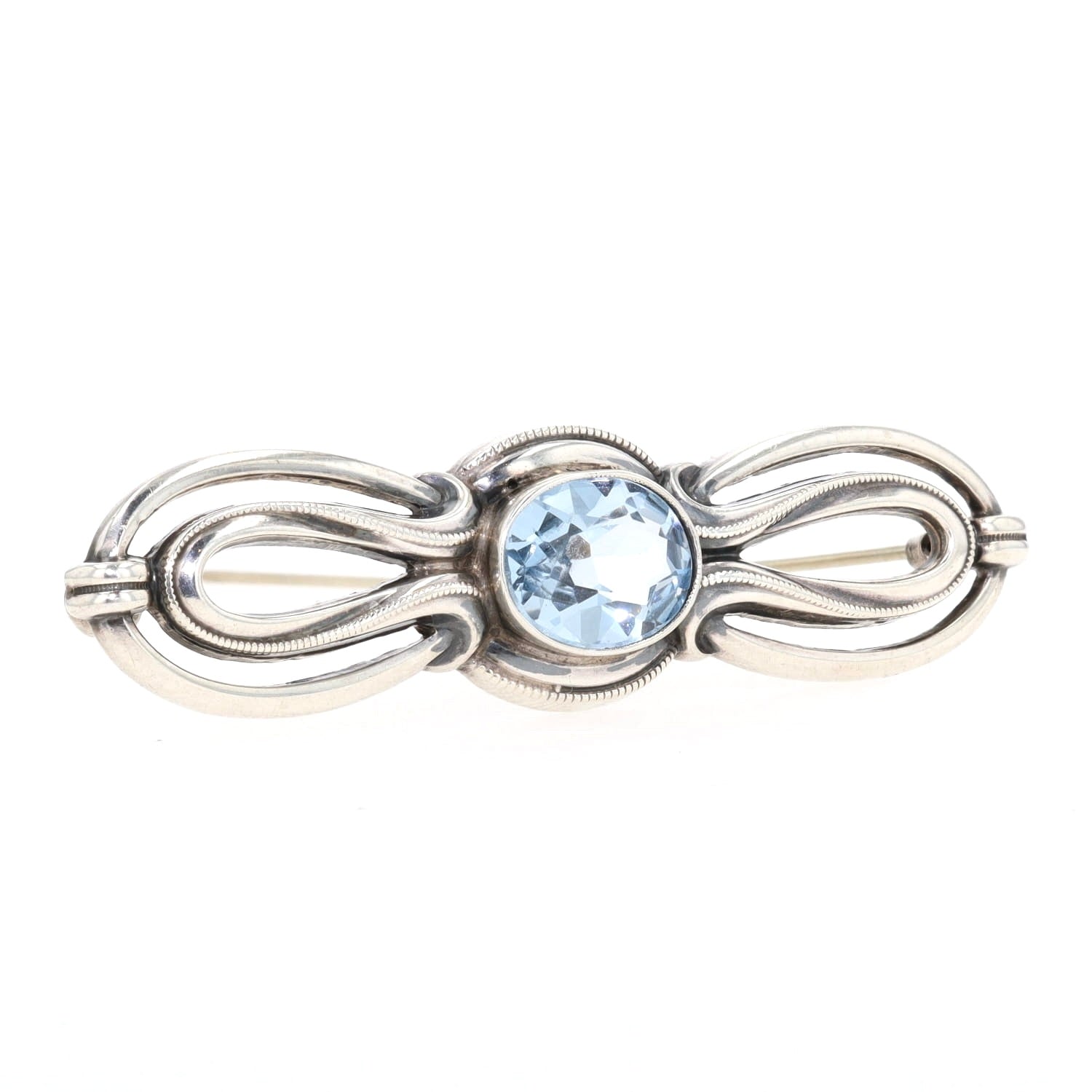Art Deco Brosche in 925 Silber mit einem blauen synth. Spinell, liegend rechts gedreht