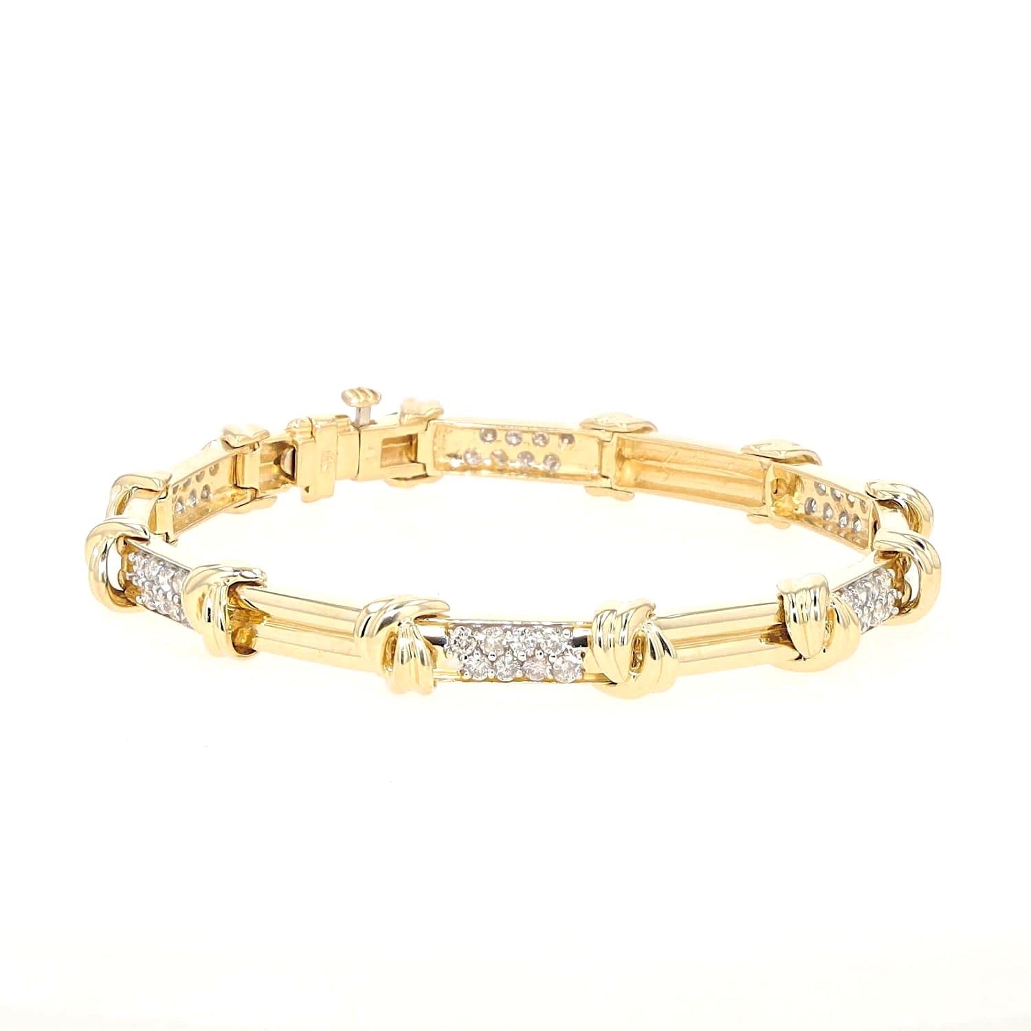 Bracelet in 585 yellow gold with a total of approx. 1.0 ct Brilliants, lying closed and turned to the right