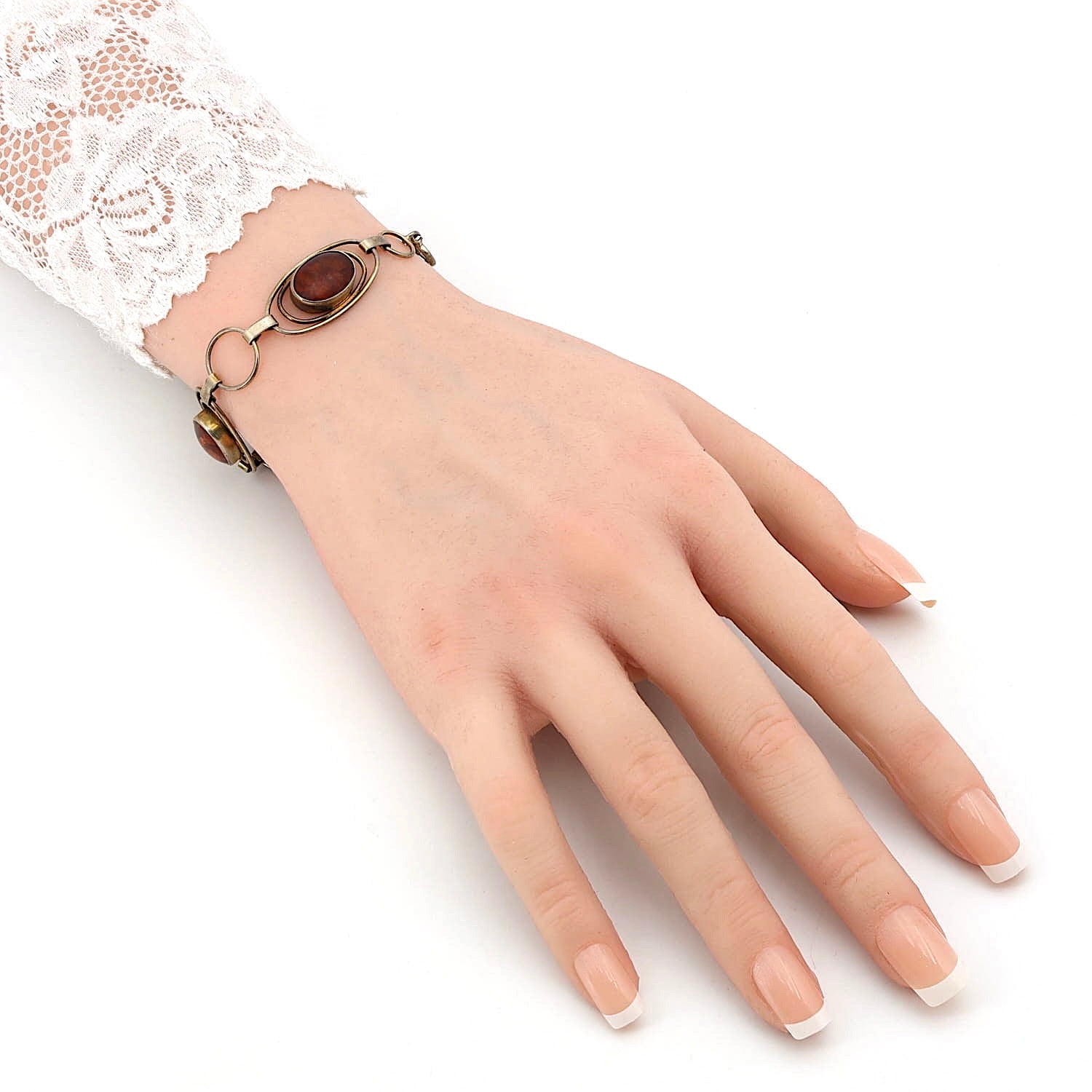 Fischland bracelet in 835 silver with amber, on an artificial hand