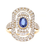 Art-Déco Ring in 750er Gold mit einem blauen Saphir und Brillanten, liegend frontal von vorne