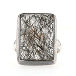 Ring in 925 silver with a rock crystal with tourmaline needles, lying frontally