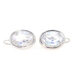 Earrings in 585 white gold with 2 blue topazes, lying sideways and frontally