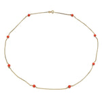 Kette in 333er Gold mit kleinen Korallenkugel, liegend geschlossen