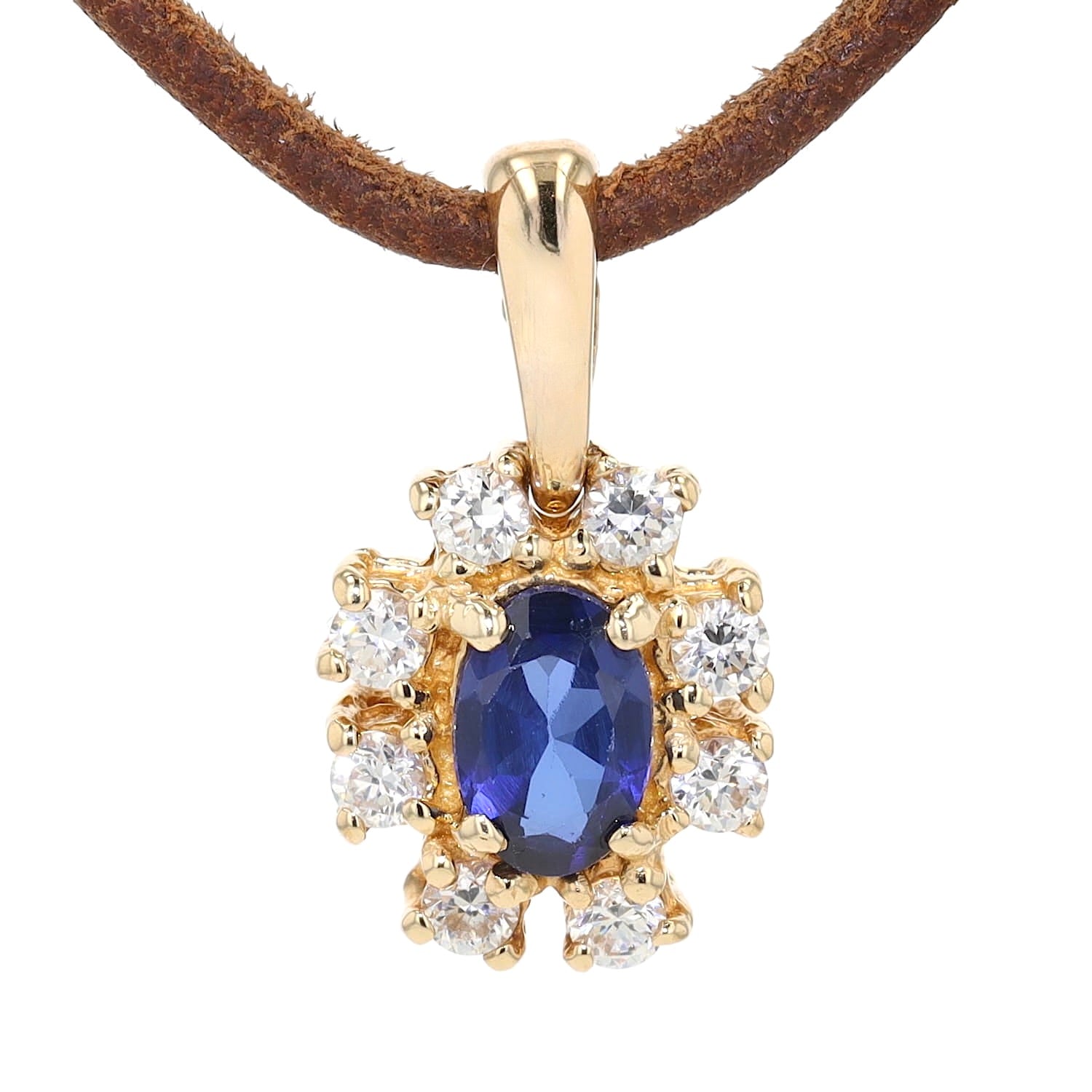 Anhänger in 585er Gelbgold mit einem synthetischen blauen Saphir und Brillanten, hängend frontal von vorne