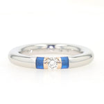 Georg Bunz Ring in 950er Platin mit einem Brillanten und synthetischen Spinellen, liegend frontal