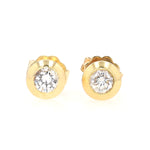 Ohrstecker in 750er Gelbgold mit je einem ca. 0,20 ct Brillanten, liegend frontal