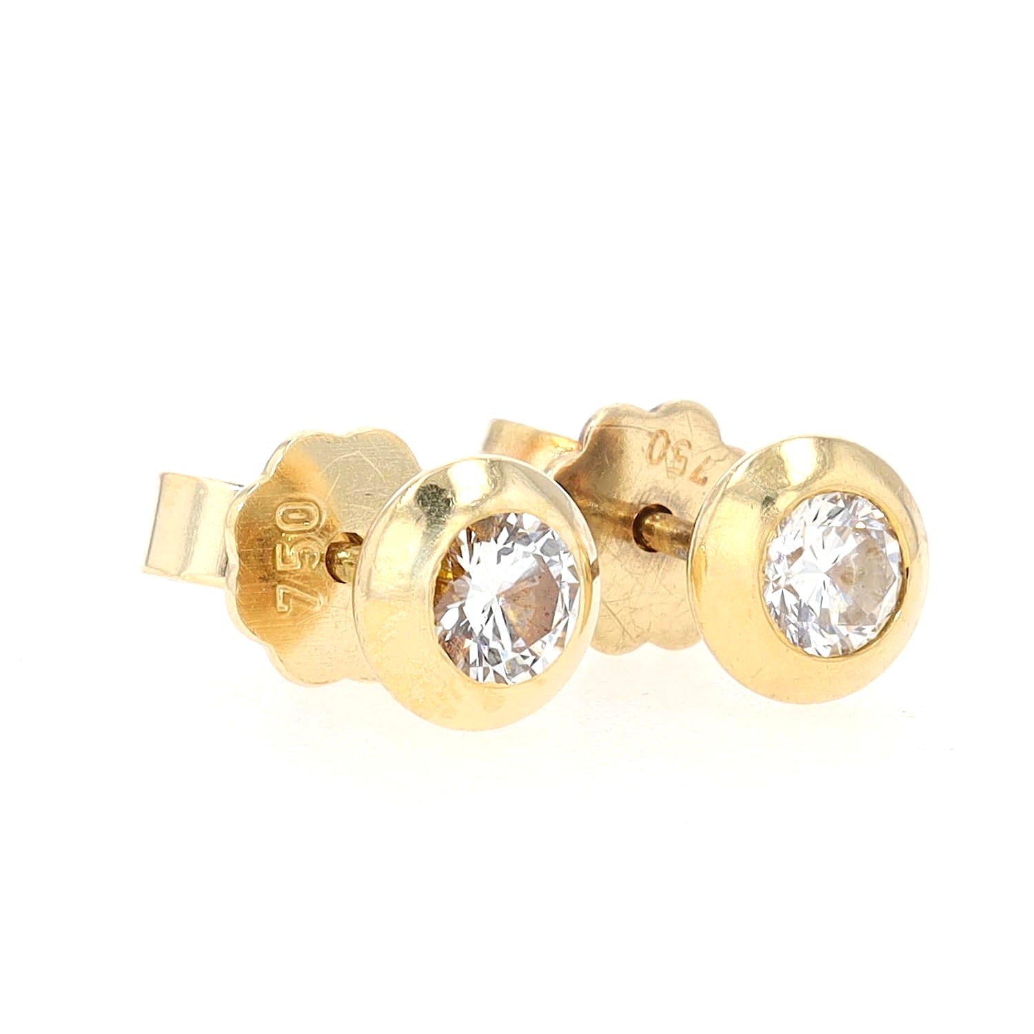 Ohrstecker in 750er Gelbgold mit je einem ca. 0,20 ct Brillanten, liegend rechts gedreht