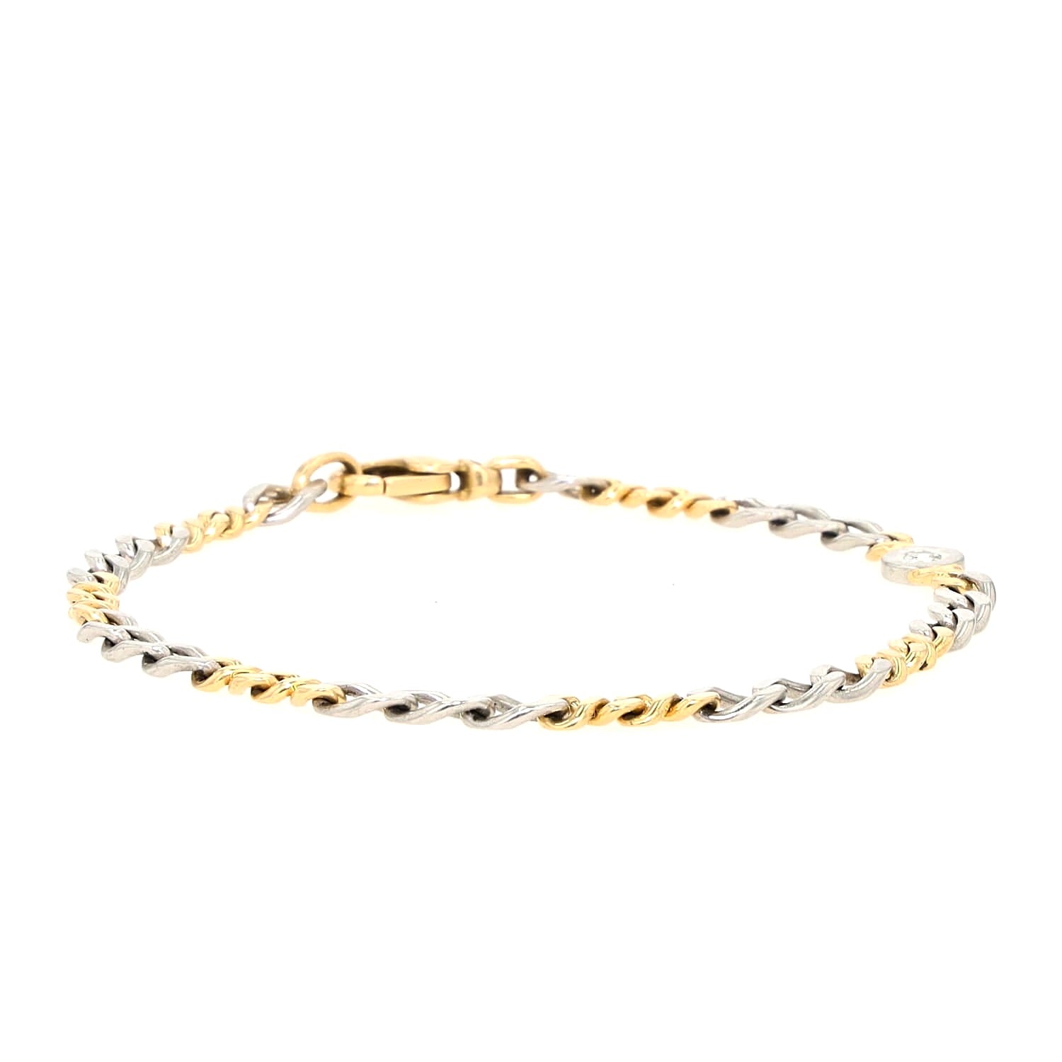Armband in 950er Platin und 750er Gelbgold mit einem Brillanten, liegend geschlossen frontal
