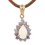Anhänger in 375er Gelbgold mit einem Opal und Tansaniten, hängend frontal