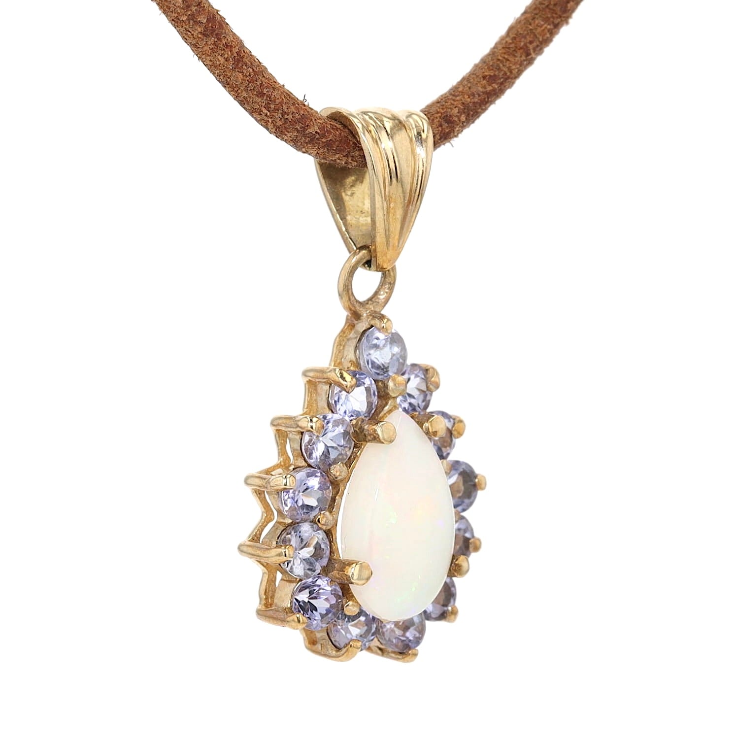 Anhänger in 375er Gelbgold mit einem Opal und Tansaniten, hängend rechts gedreht