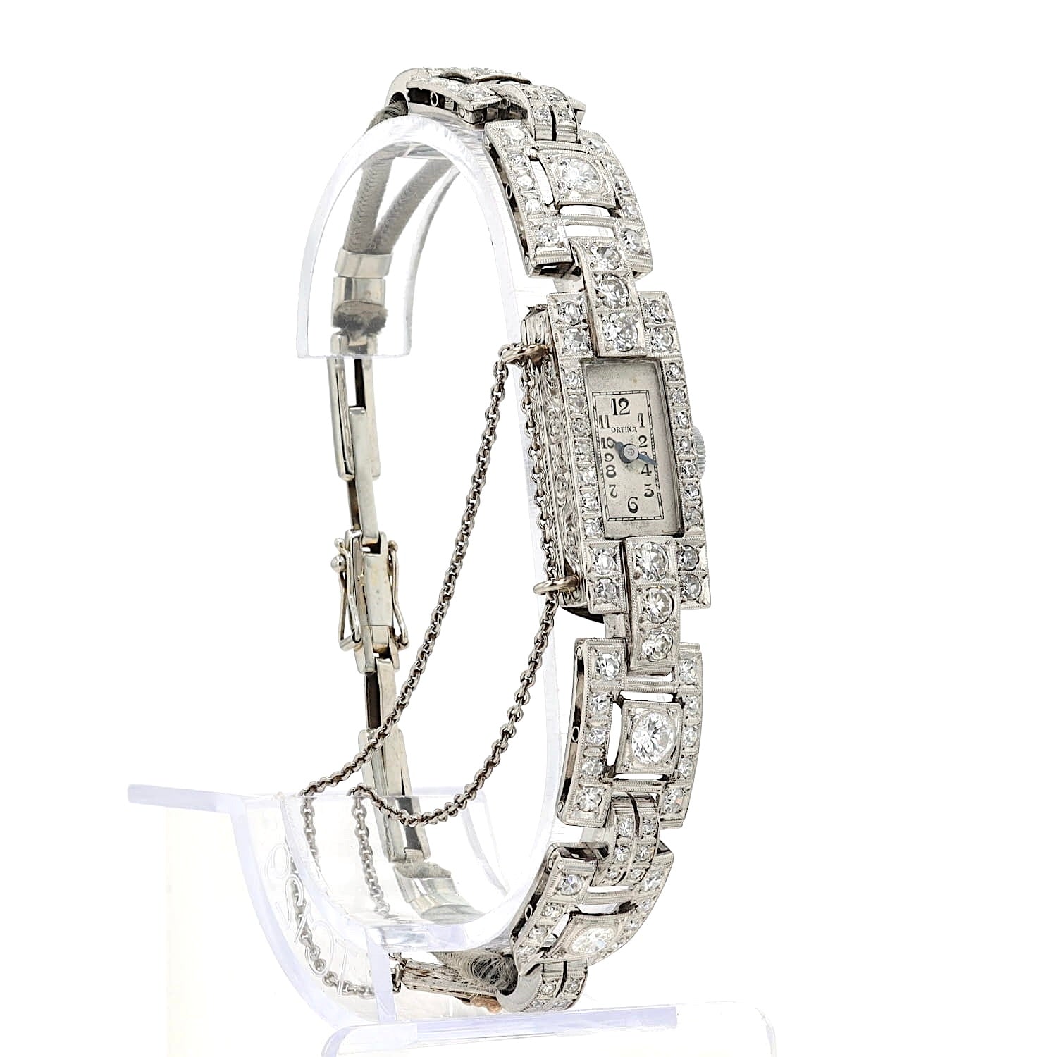 Art Deco jewelry watch Orfina with a total of approx. 2.1 ct diamonds and Brilliants,  standing on an exhibitor, turned slightly to the right