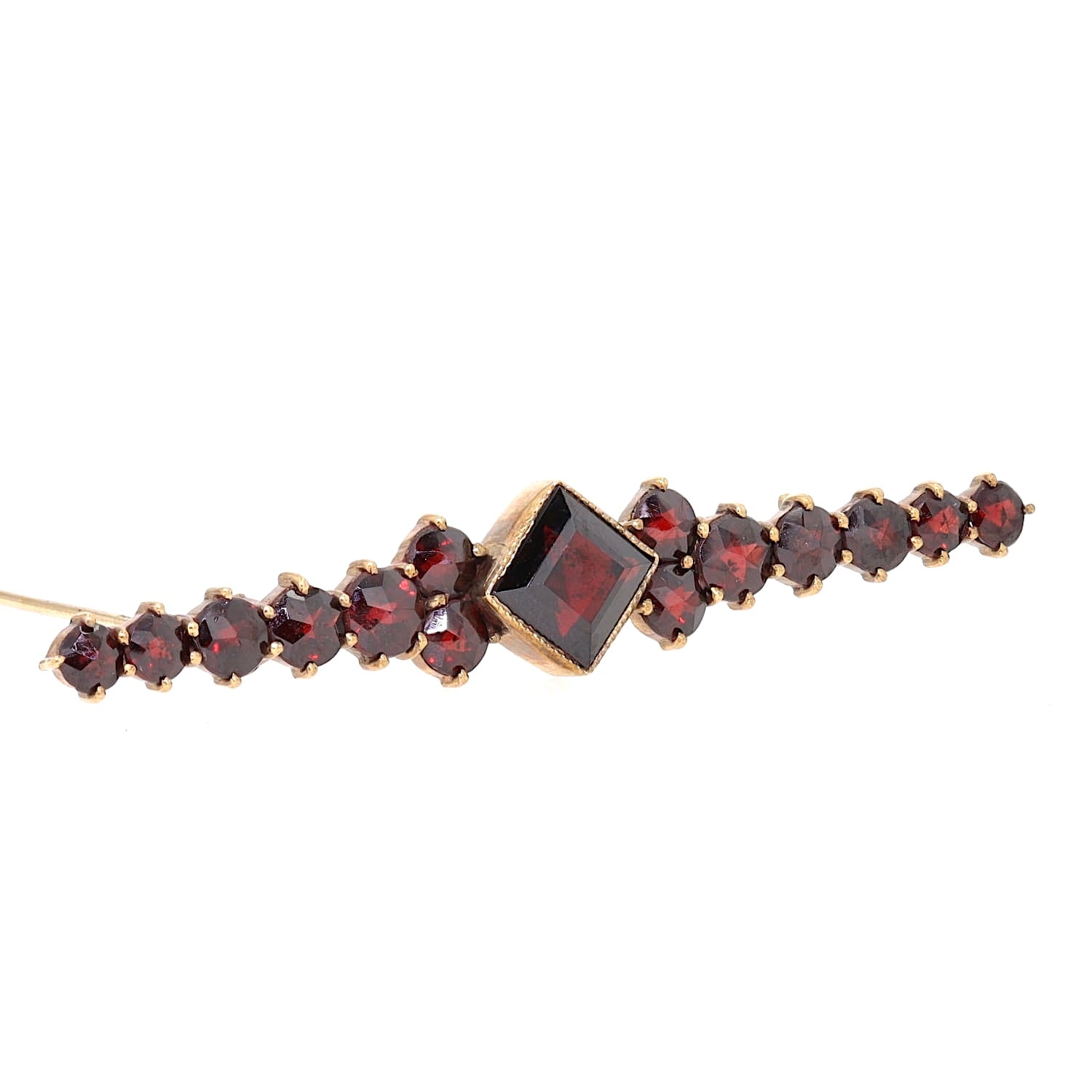 Vintage brooch in 333 red gold with garnets, turned lying on the right