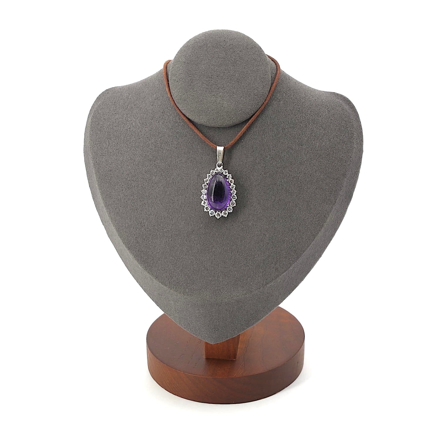 Pendant in 585 white gold with a teardrop-shaped amethyst and approx. 1.27 ct Brilliants, on a dark bust