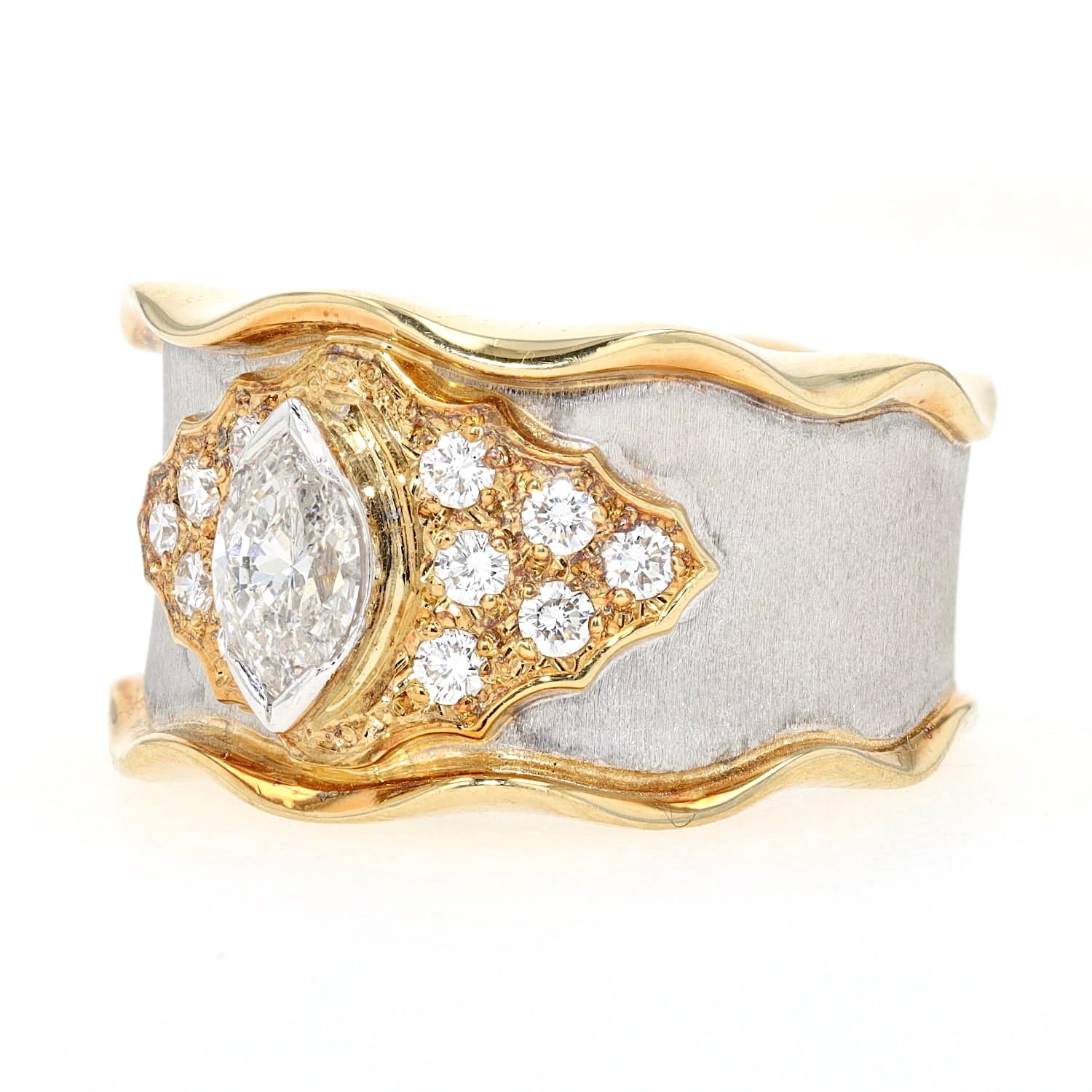 Unique ring in 750 yellow gold and platinum with a total of approx. 0.73 ct diamonds, turned left