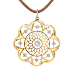 Art Nouveau pendant made of 750 yellow gold with diamonds in a floral design, hanging from the front