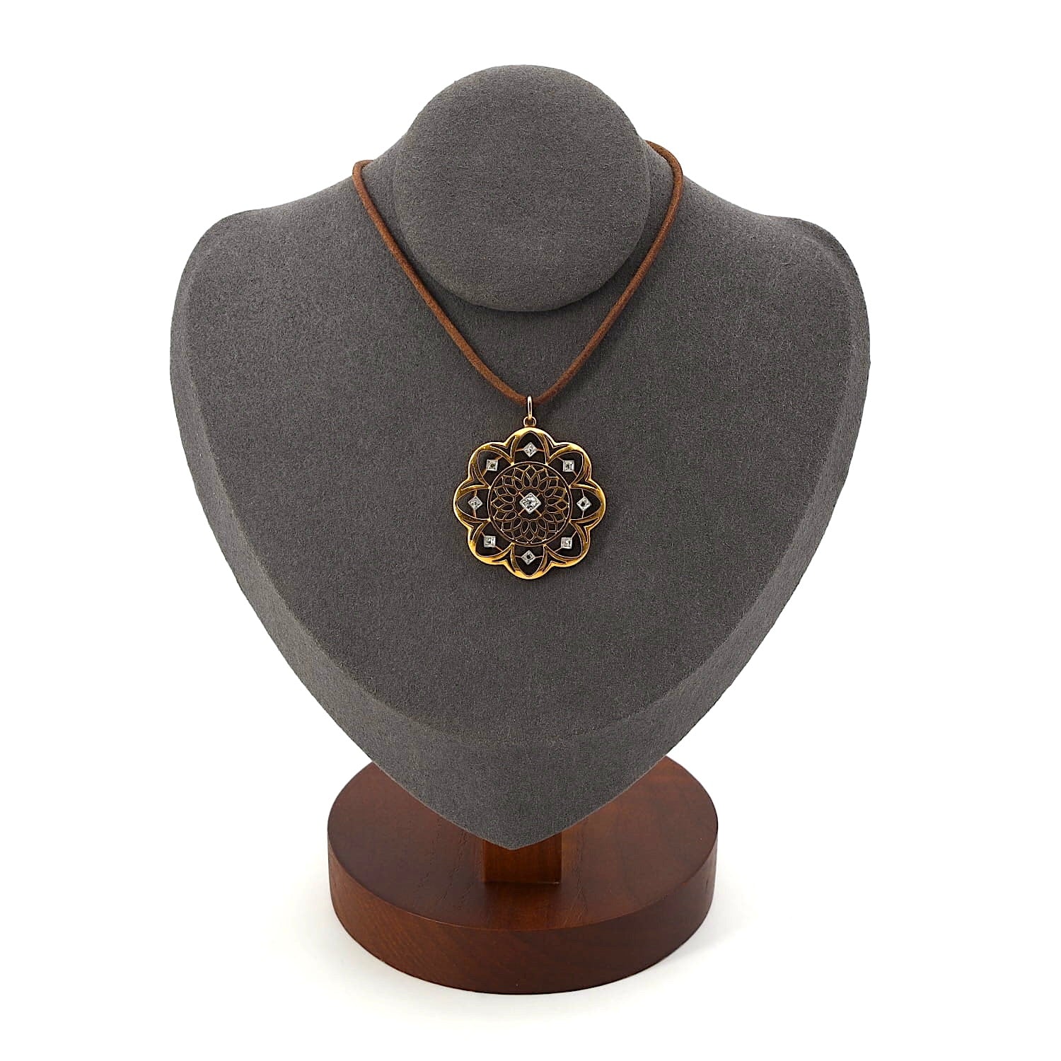 Art Nouveau pendant made of 750 yellow gold with diamonds in a floral design, on a dark bust