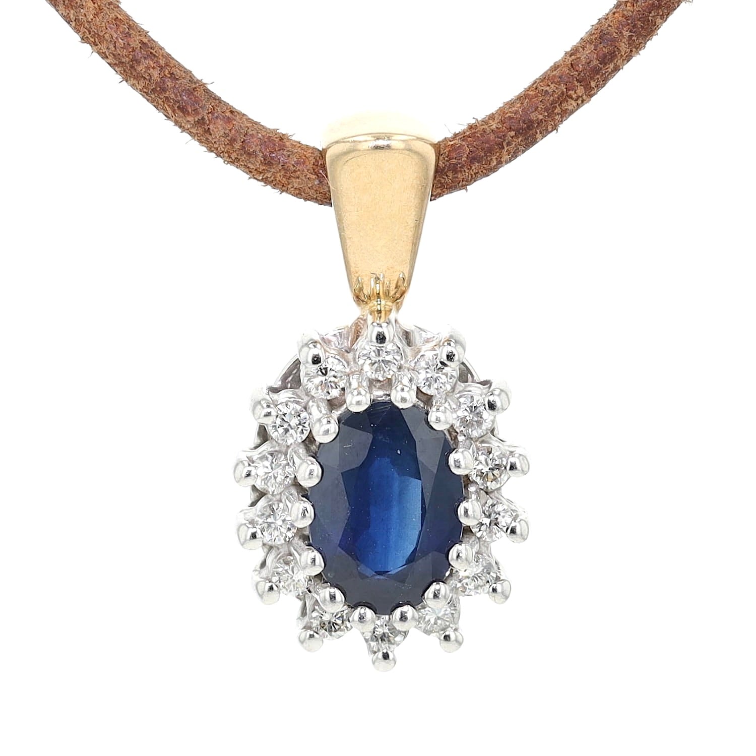 Pendant from Christ in 585 bicolor gold with a sapphire and Brilliants, hanging frontally