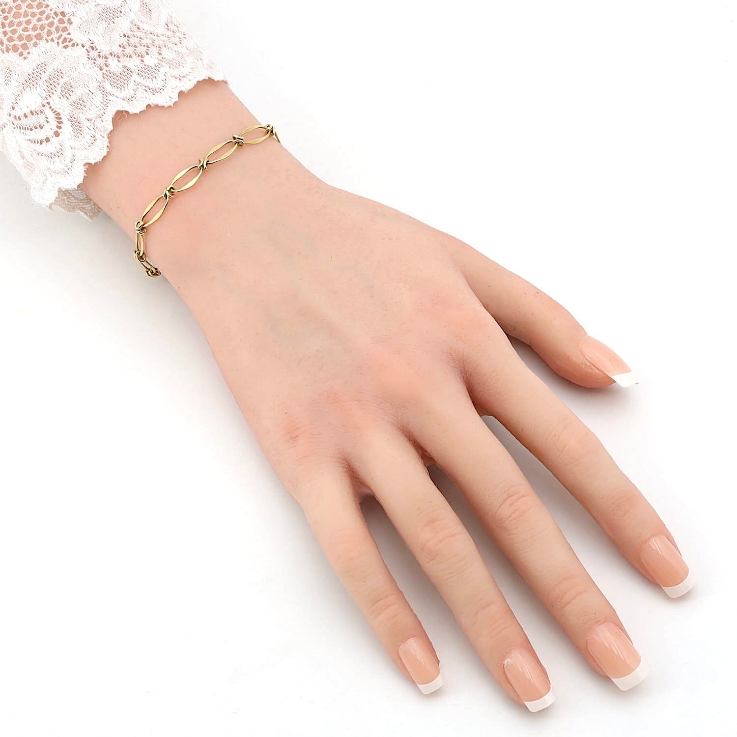 Armband in 585er Gelbgold, an einem künstlichen Arm