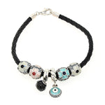 Bracelet in 925 silver with 6 charms from Pandora, lying closed top view