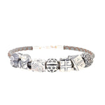 Gray leather bracelet with 7 charms, 6 of which are Pandora beads, lying frontally