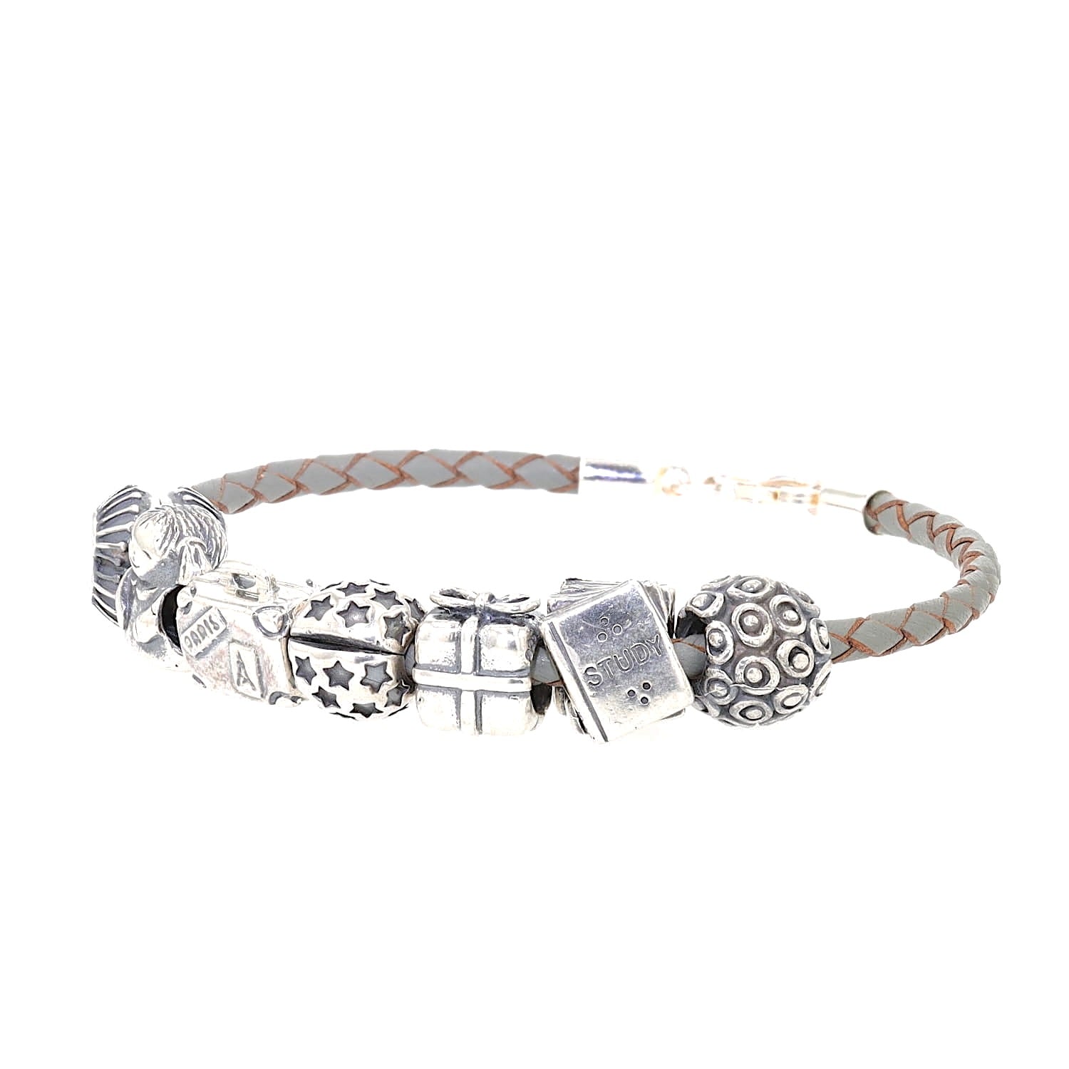 Gray leather bracelet with 7 charms, 6 of which are Pandora beads, lying frontally