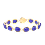 Bracelet in 585 yellow gold with cabochon-cut lapis lazuli, closed at the front