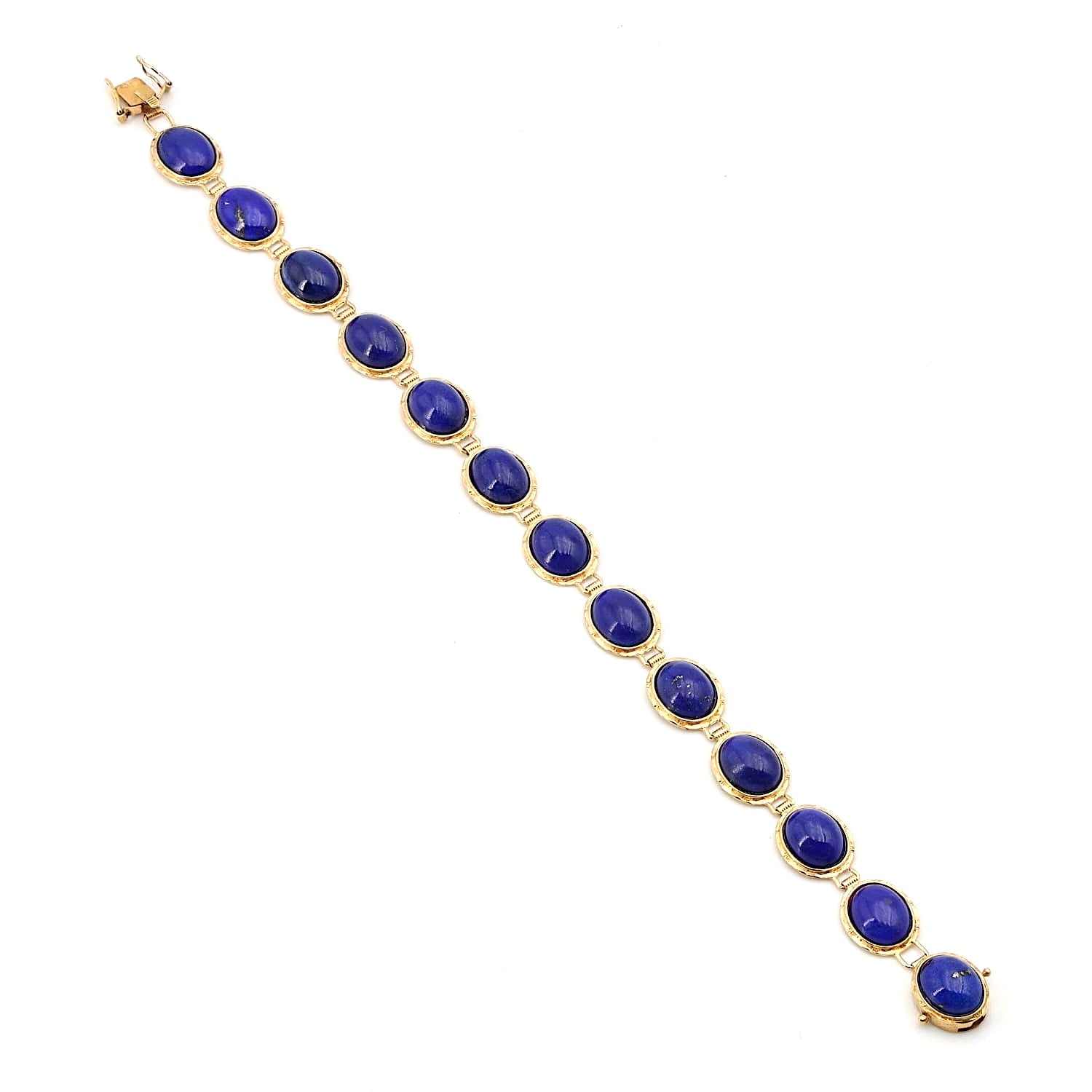 Bracelet in 585 yellow gold with lapis lazuli in cabochon cut, lying long