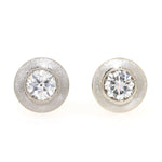 Ohrstecker in 585er Gelb- und Weißgold mit je einem Brillanten, insgesamt ca. 0,60 ct, liegend frontal