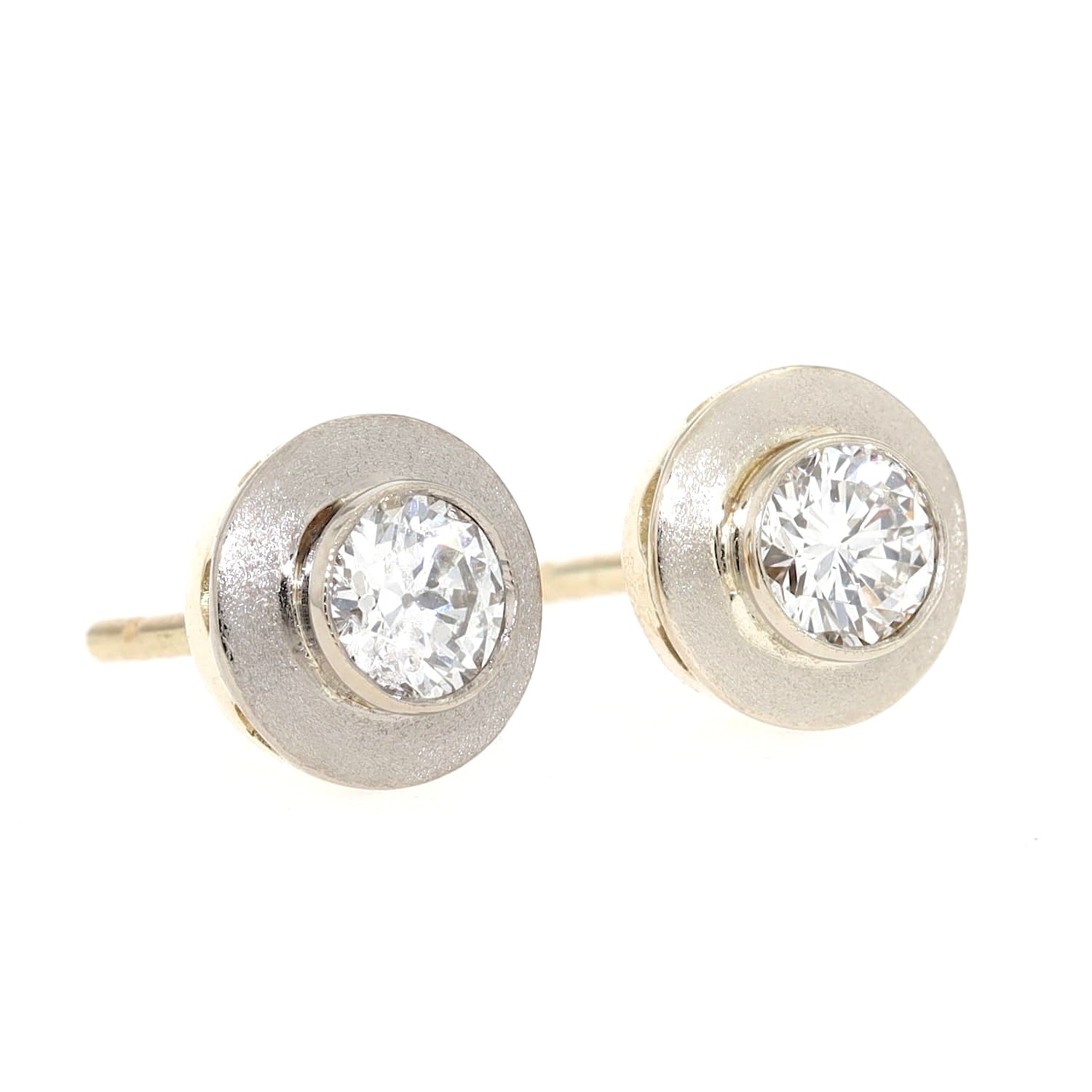 Ohrstecker in 585er Gelb- und Weißgold mit je einem Brillanten, insgesamt ca. 0,60 ct, liegend rechts gedreht