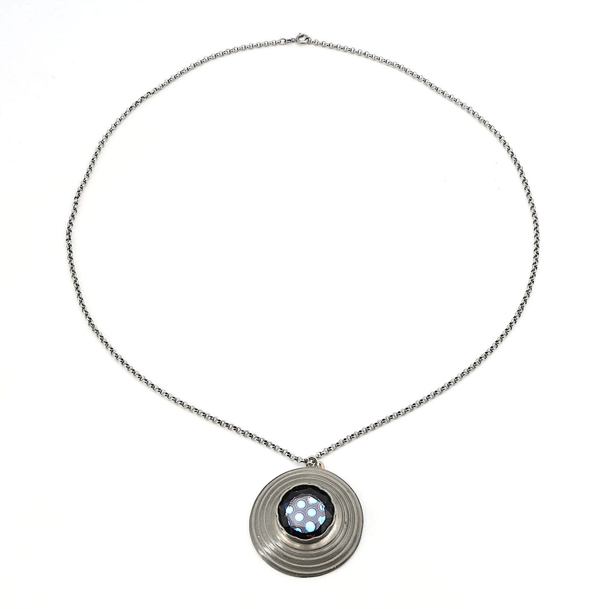 Vintage chain made of 925 silver with a Danish pendant made of pewter with a blue glass stone, lying closed