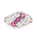 Ring in 585 white gold with rubies and diamonds, lying frontally