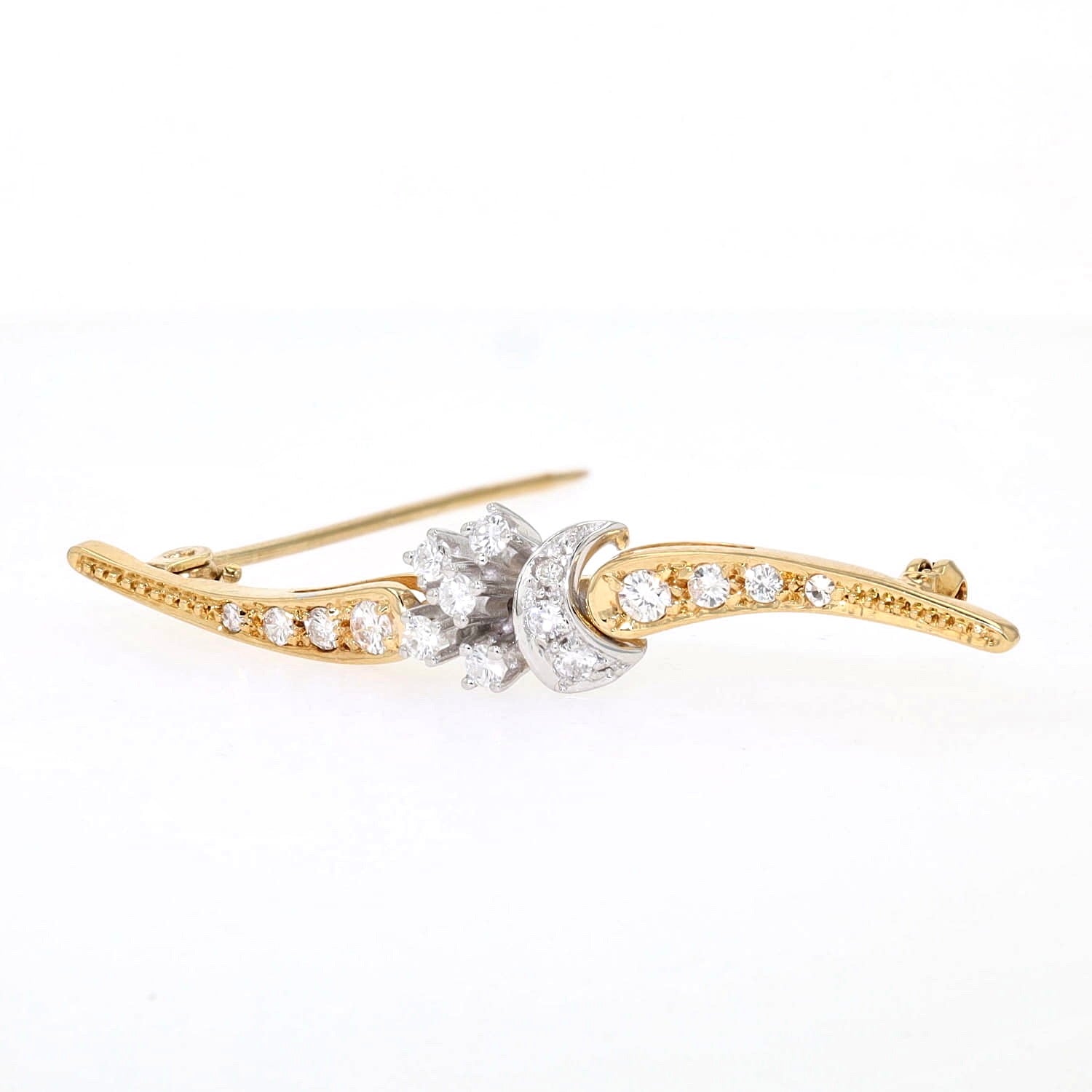 Brosche in 585er Bicolor Gold mit insgesamt ca. 0,43 ct Diamanten und Brillanten, liegend links gedreht