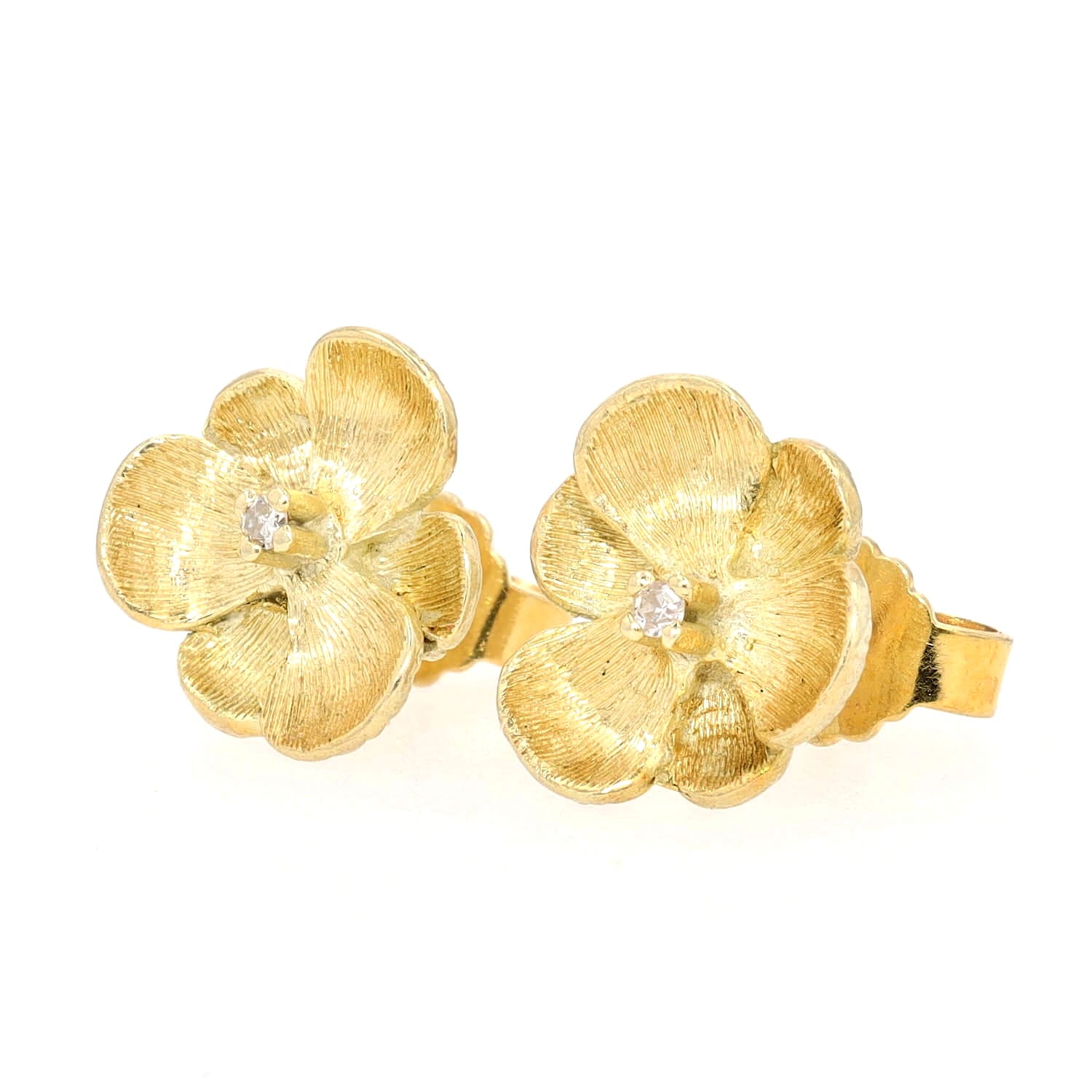 Ohrstecker in Blütenform aus 585er Gelbgold mit je einem Diamanten, liegend links gedreht
