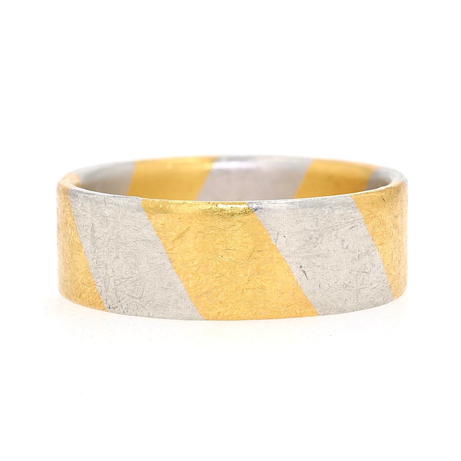 Niessing ring in 950 platinum with 1000 gold plating, turned left lying