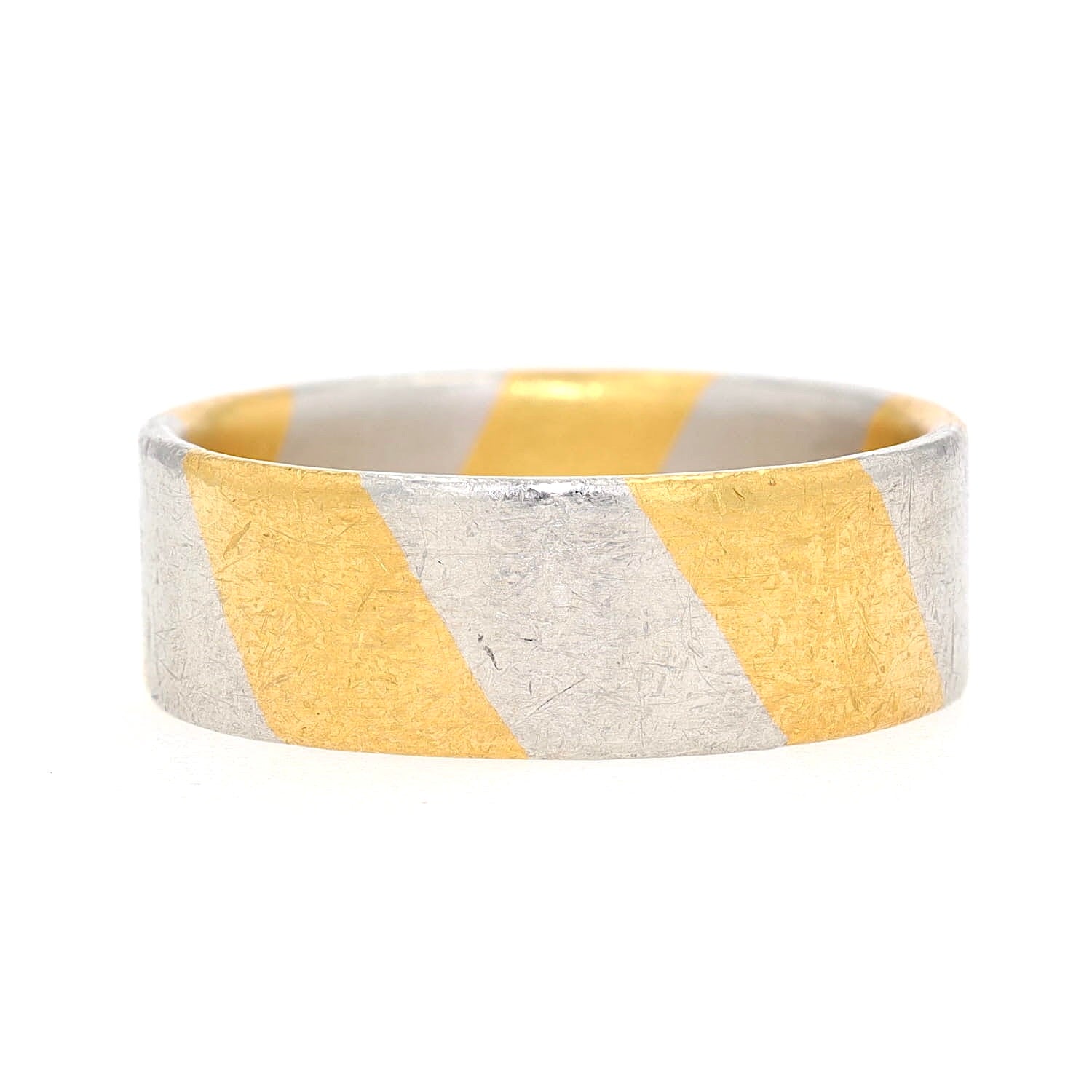 Niessing ring in 950 platinum with 1000 gold plating, turned lying on the right