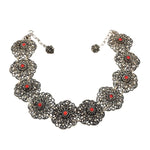 Short traditional jewelry necklace/collar in 925 silver with imitation coral, lying not completely closed
