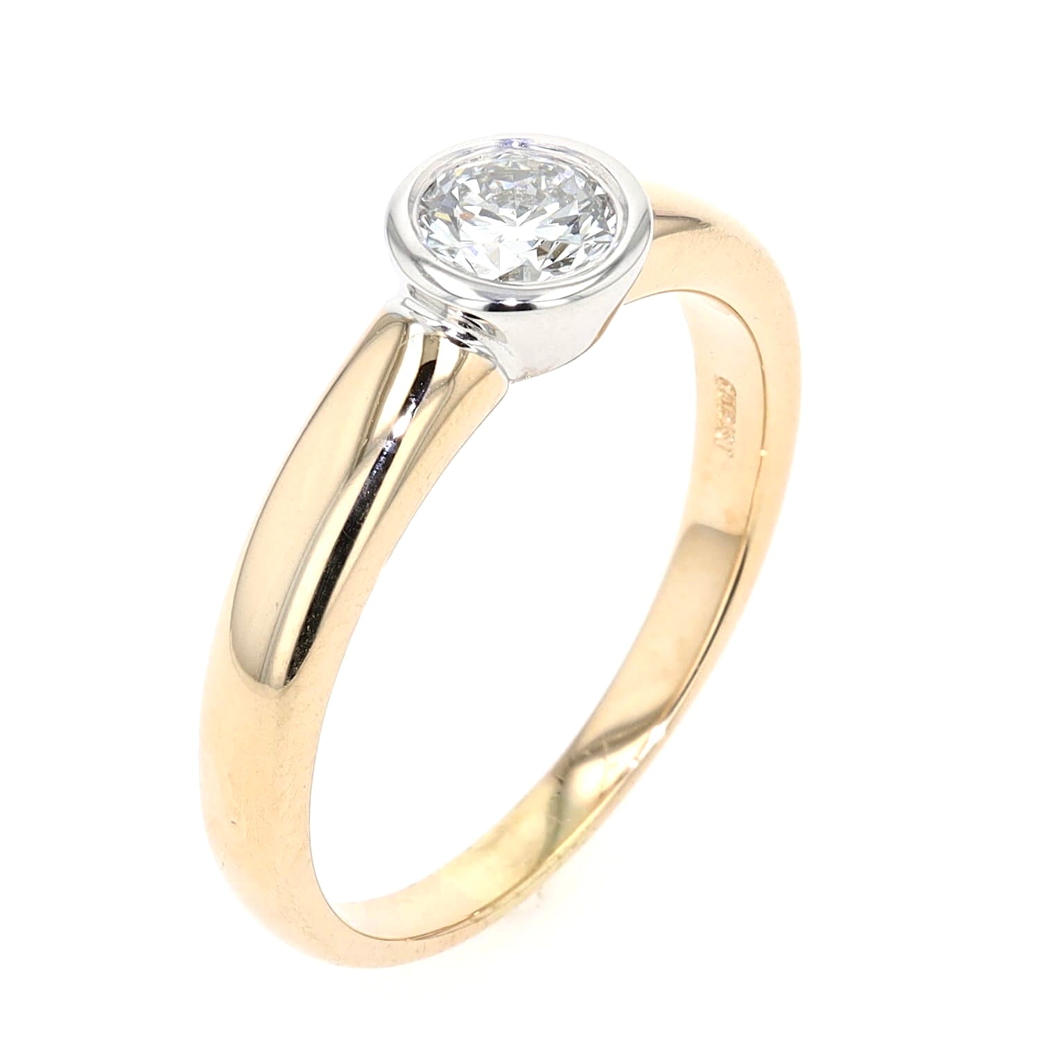 Christ Ring in 585er Gelb- und Weißgold mit einem Brillanten ca. 0,56 ct, stehend