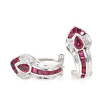 Pair of stud earrings in 750 white gold with rubies and Brilliants, one standing, one lying frontally