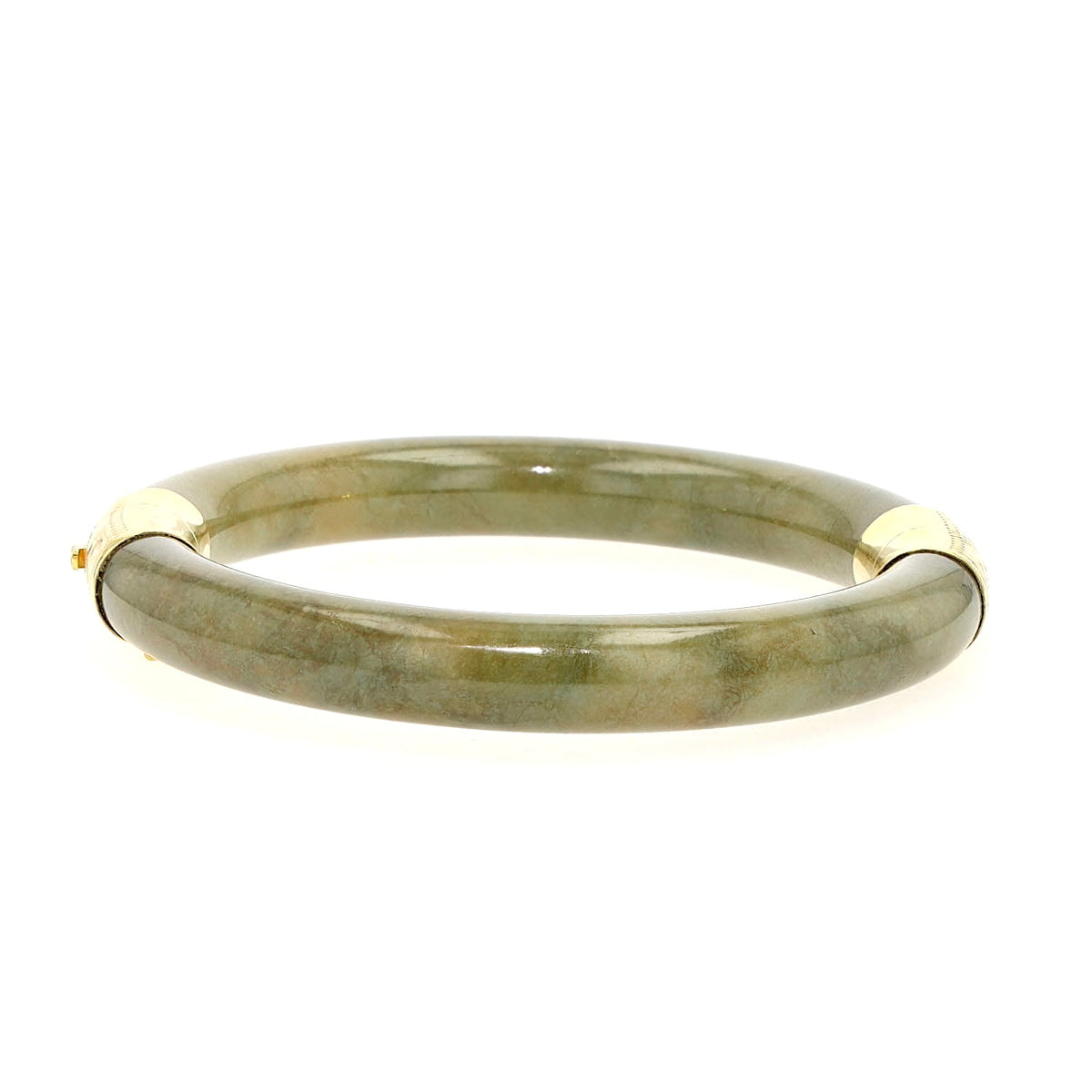 Bangle with jade elements and 585 yellow gold, lying frontally