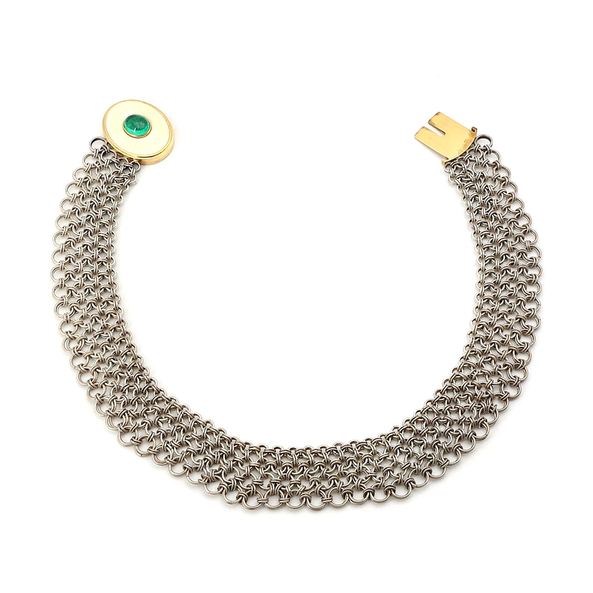 Vintage necklace made of silver, 750 yellow gold and a plate made of bone with an oval emerald cabochon, lying open piece