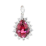Pendant in 750 white gold with a rubellite, Brilliants and a diamond, hanging frontally