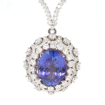 Magnificent necklace in 585 white gold with a large tanzanite and a total of approx. 10.5 carats Brilliants, hanging frontal close-up pendant