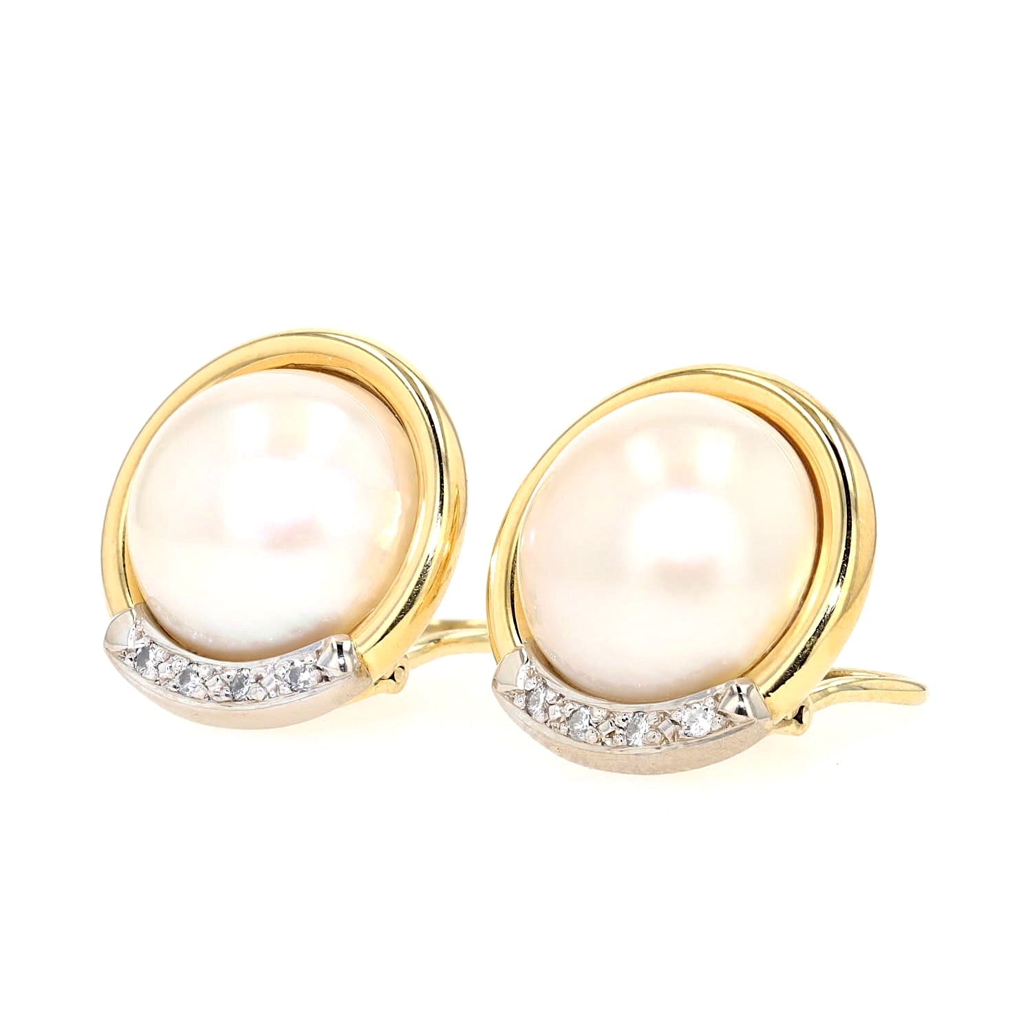 Clip-on earrings in 585 yellow gold, each with a large size.cultured pearl and diamonds, turned lying left
