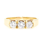 Ring in 585 yellow gold with three Brilliants total approx. 0.68 ct, lying frontally