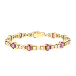 Armband in 585er Gelbgold mit Brillanten und Rubinen, liegend geschlossen frontal